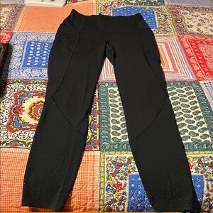 Lululemon Black Athletic Leggings with Perforated Lower Panels. size 4